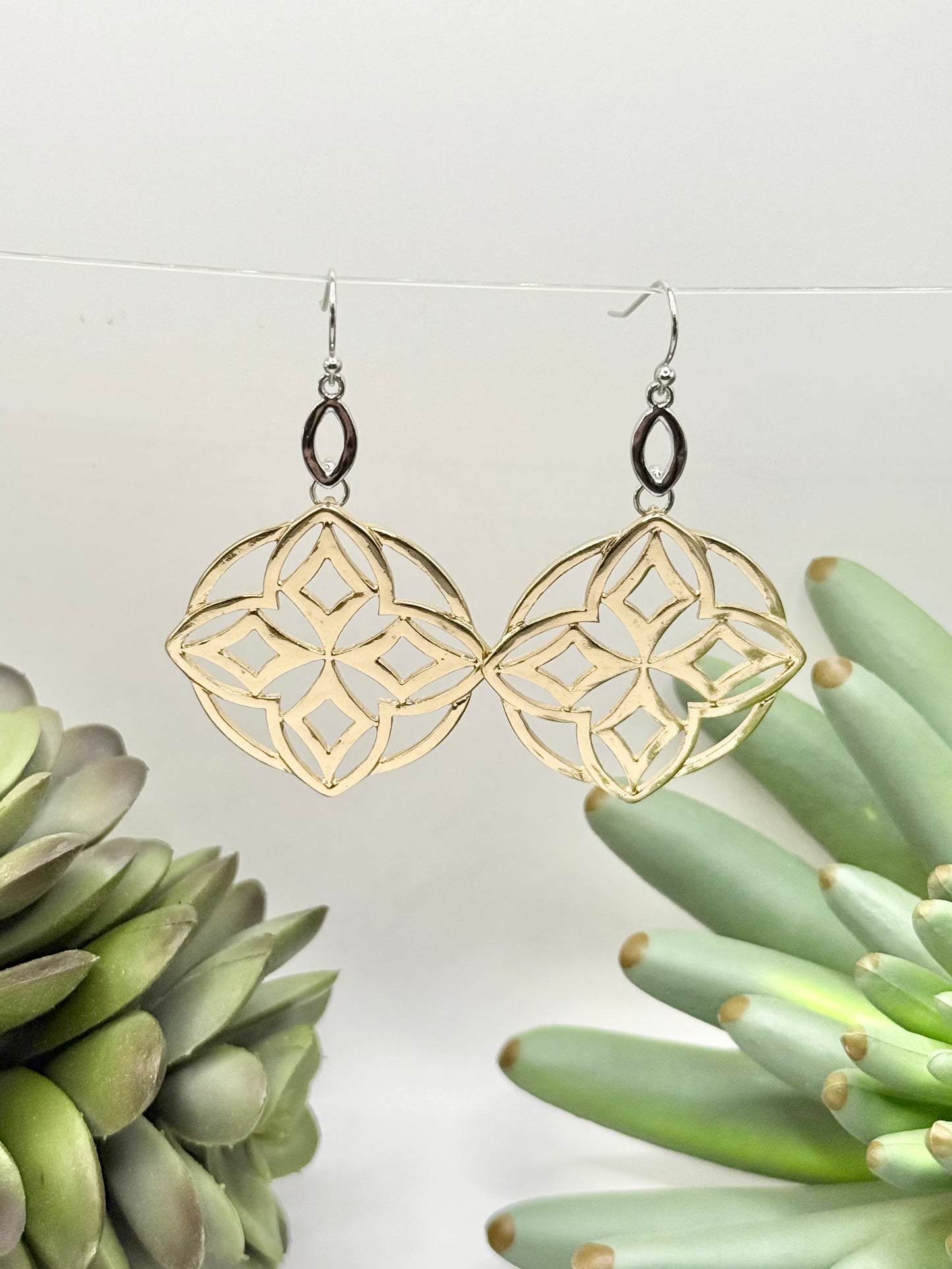 Gold Star Dangle Earrings